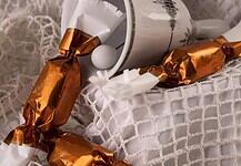 Hungarian szaloncukor: Who sneaks the candy from its wrapping?