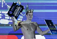 Hubert Kós Sets World Record in 200-meter Backstroke
